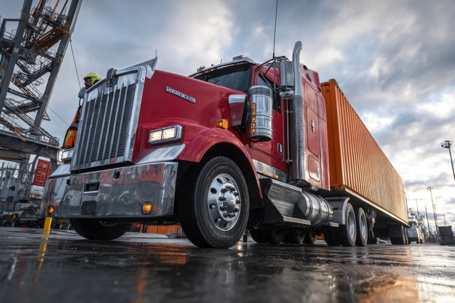 Red fleet truck being cleaned with heavy-duty truck wash soap